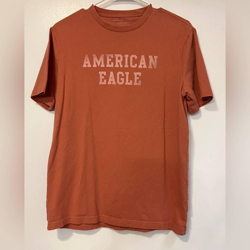 America can eagle super soft t-shirt. Standard fit orange/peach color
